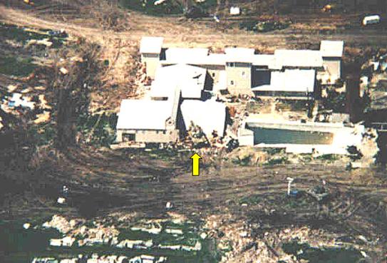 U.S. Government tank on roof while people are inside.